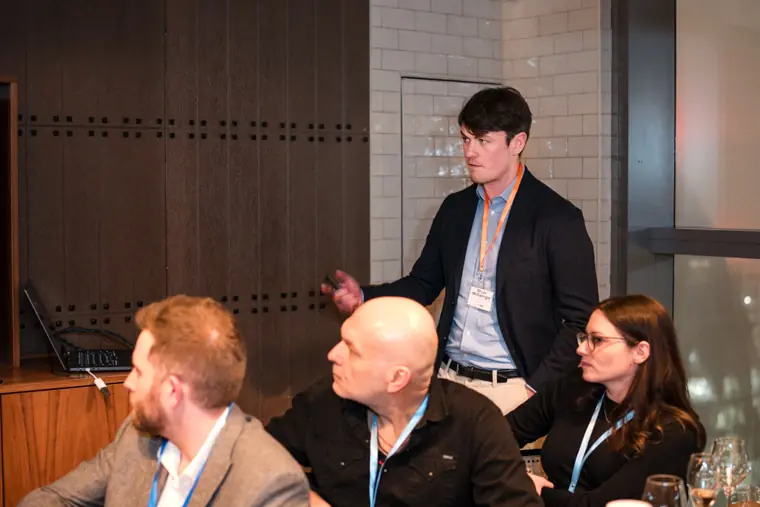 Guests and speakers at the ClickUp client dinner.