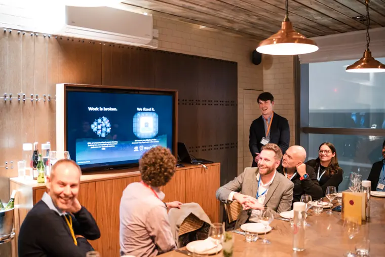Guests and speakers at the ClickUp client dinner.