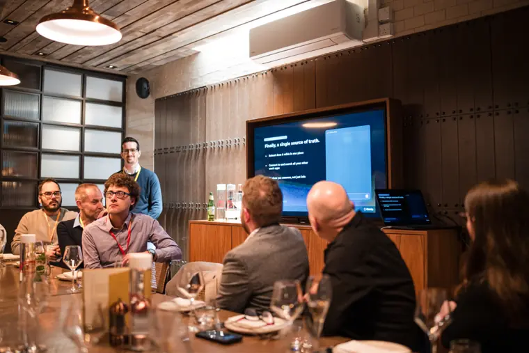 Guests and speakers at the ClickUp client dinner.