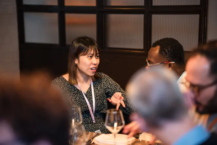 Guests and speakers at the ClickUp client dinner.