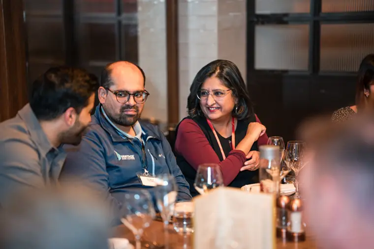 Guests and speakers at the ClickUp client dinner.
