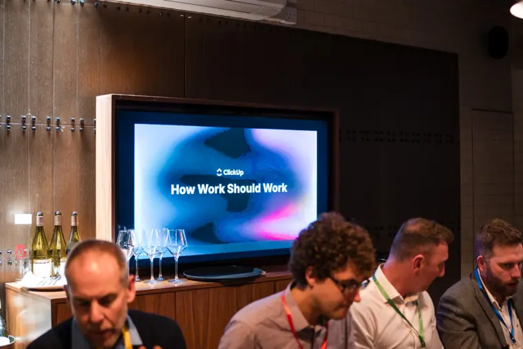 ClickUp event screen beside the table.