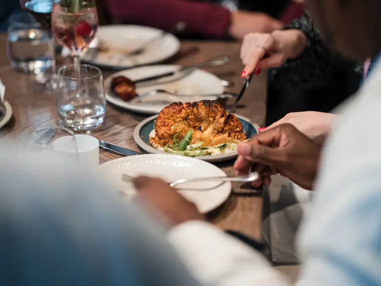 A meal served at the ClickUp client dinner.