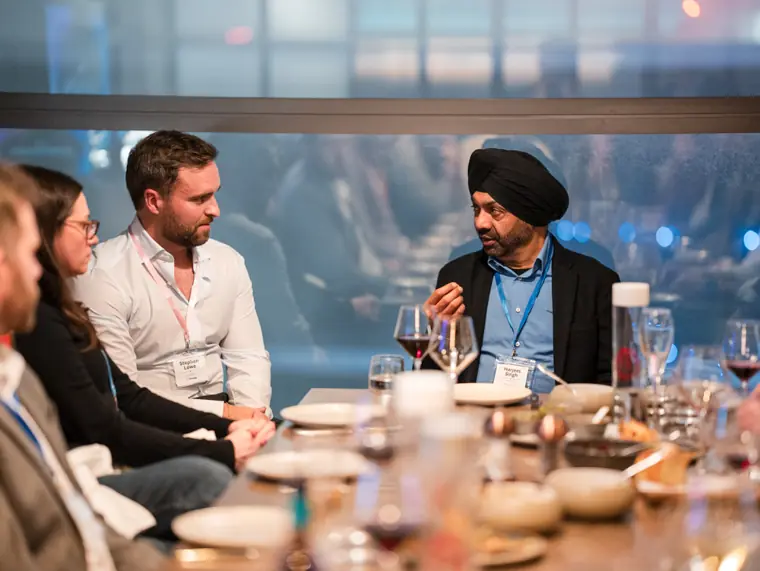 Conversation during the ClickUp dinner.