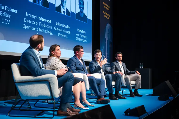 Conference speakers and panel discussion.