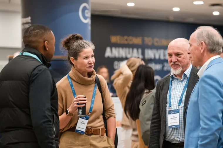Guests connecting at the investor meeting.