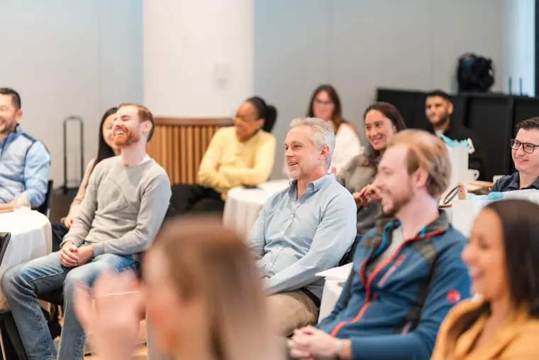 Audience following the programme.