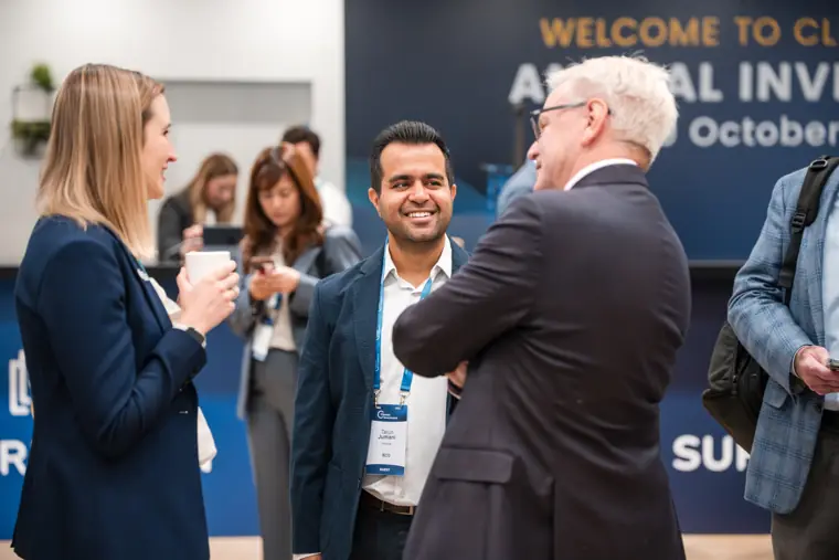 Guests connecting at the investor meeting.