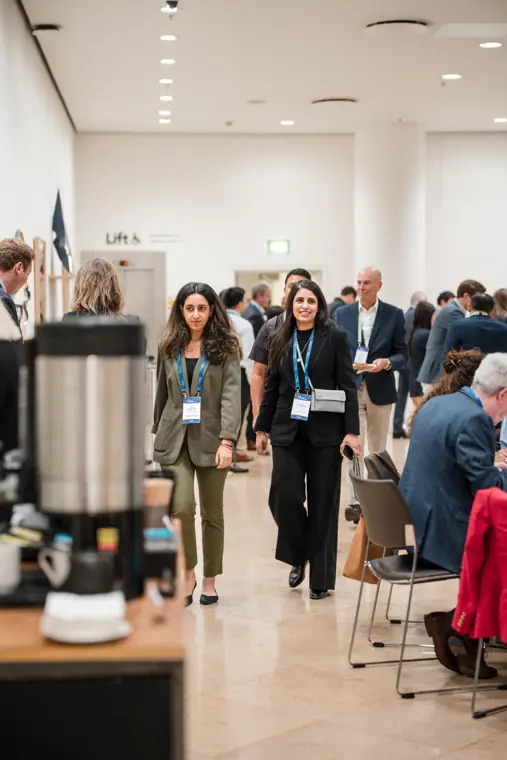 Guests connecting at the investor meeting.