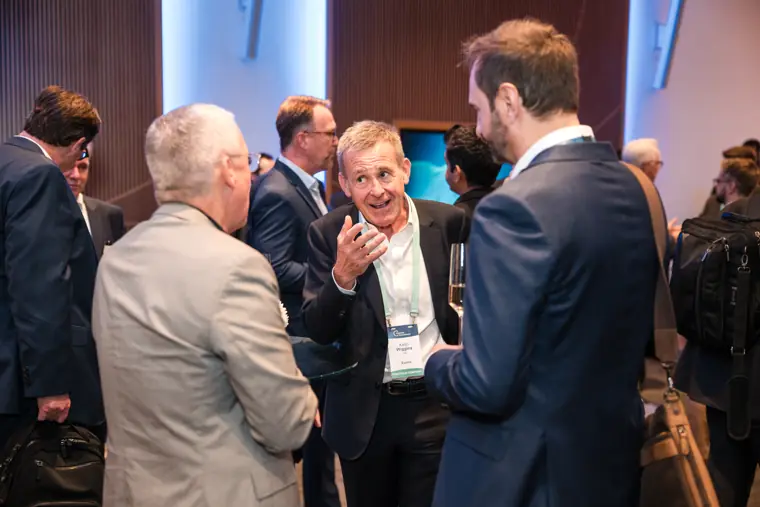 Guests connecting at the investor meeting.