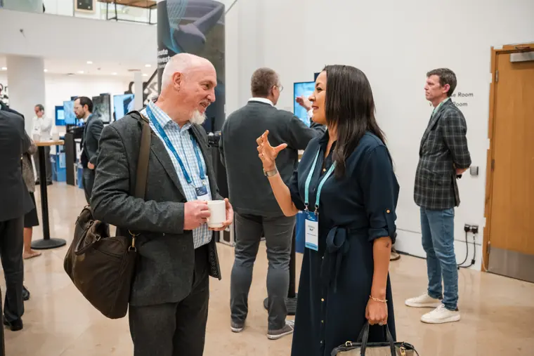 Guests connecting at the investor meeting.