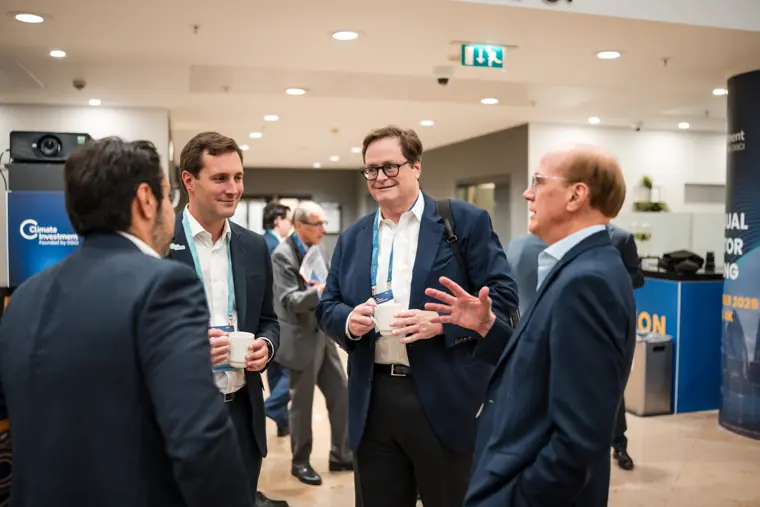 Guests connecting at the investor meeting.