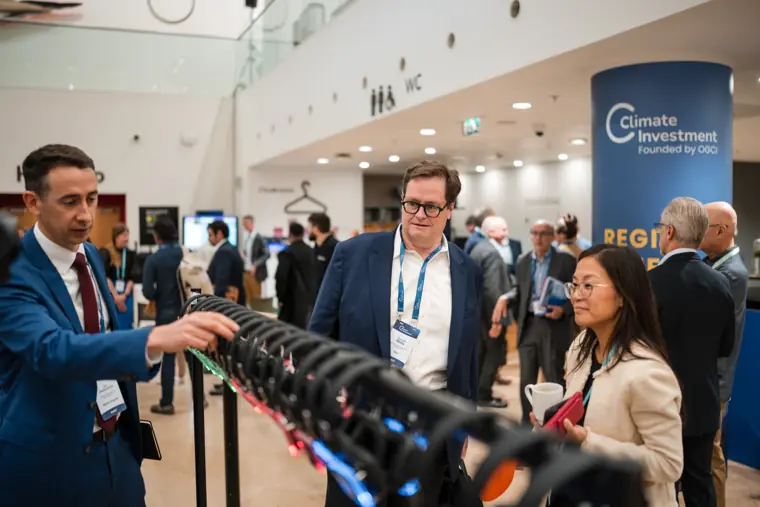 Guests connecting at the investor meeting.