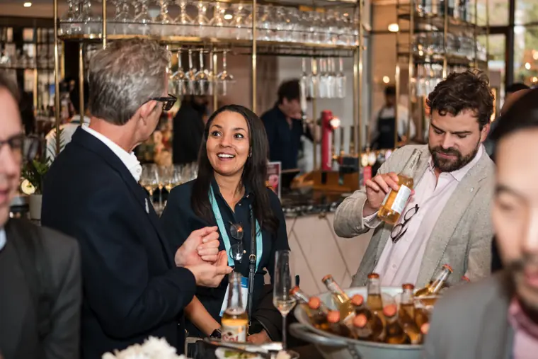 Guests connecting at the investor meeting.