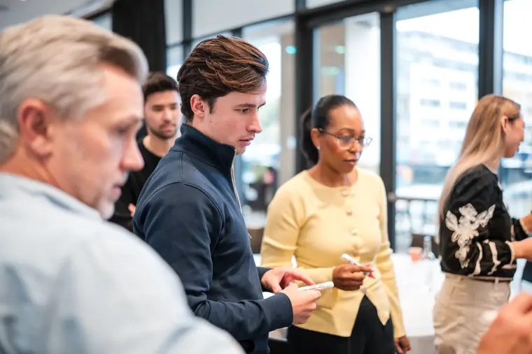Guests connecting at the investor meeting.