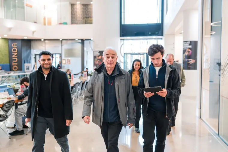 Guests connecting at the investor meeting.