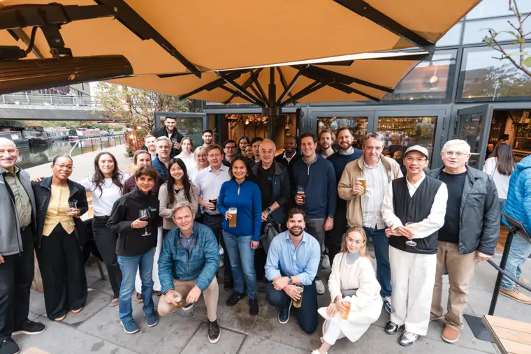 Guests connecting at the investor meeting.