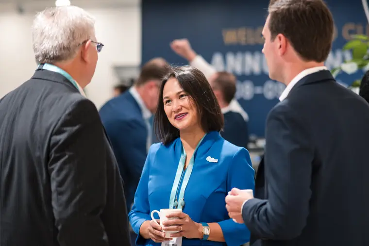 Guests connecting at the investor meeting.
