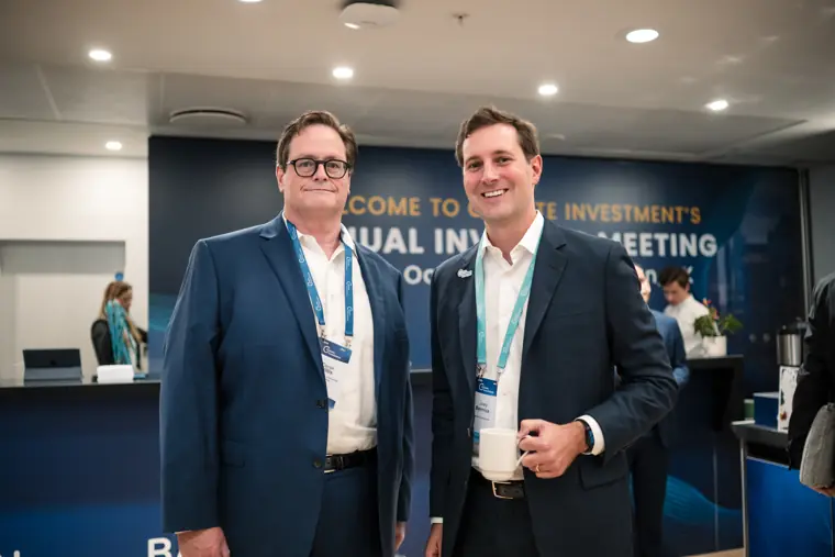 Guests connecting at the investor meeting.