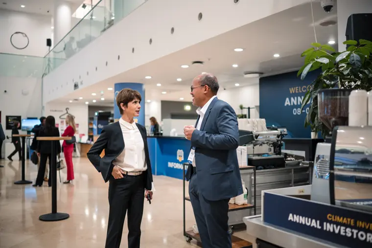 Guests connecting at the investor meeting.