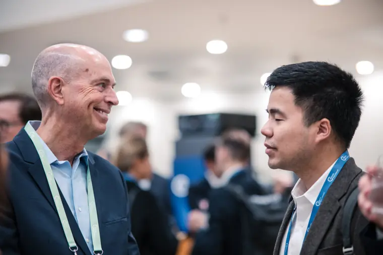 Guests connecting at the investor meeting.