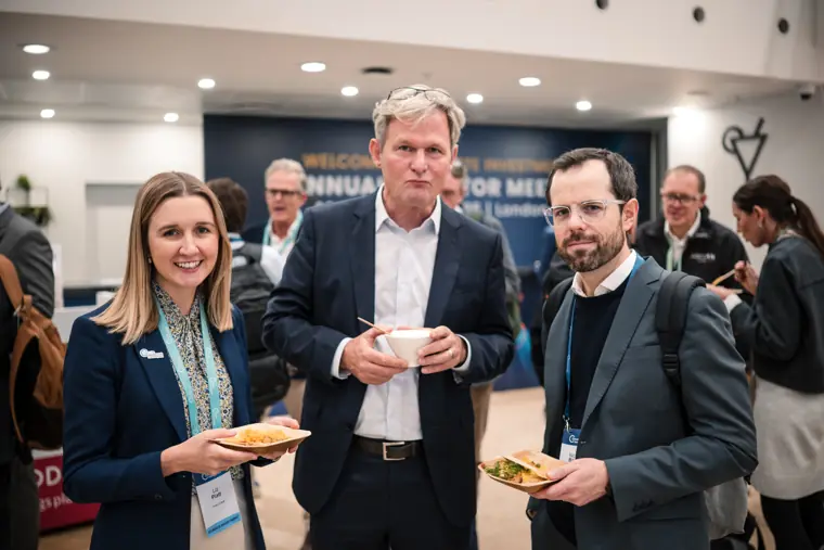 Guests connecting at the investor meeting.