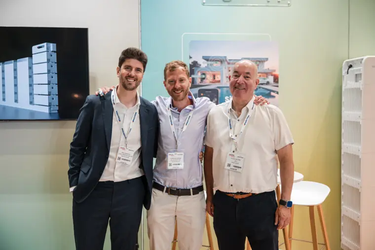 Three team members pose together at InstallerSHOW.