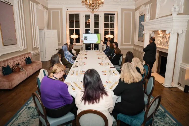 Wide view of the seated masterclass.