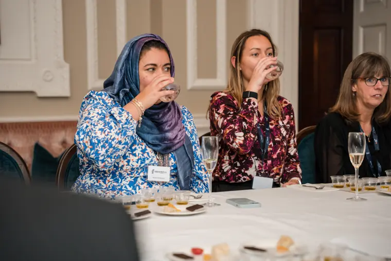 Attendees trying the tasting samples.