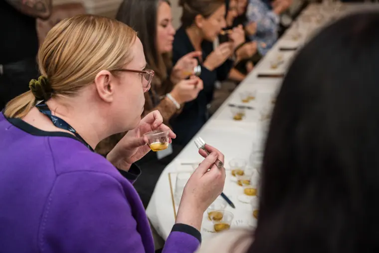 Guests tasting and discussing flavours together.