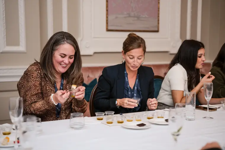 Guests comparing their tasting impressions.