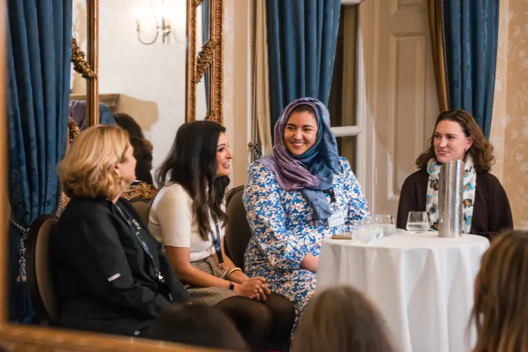 Panelists sharing their perspectives with guests.