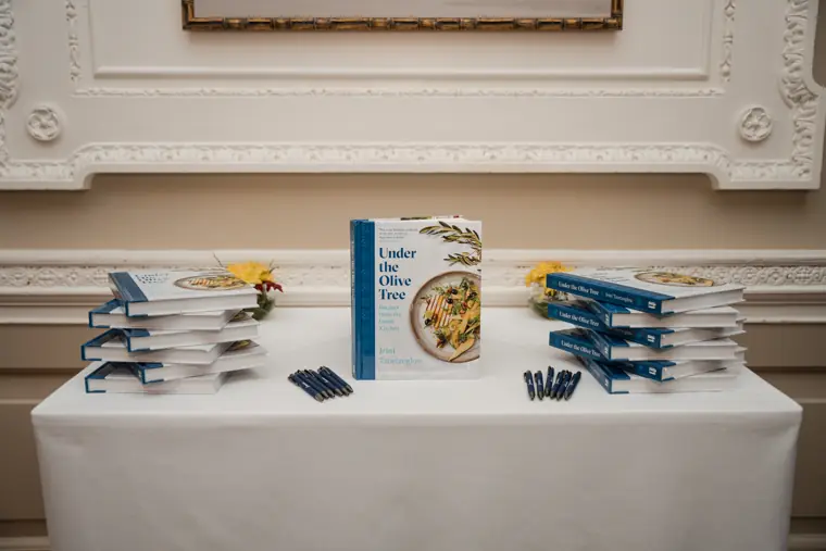 Recipe books laid out as event gifts.
