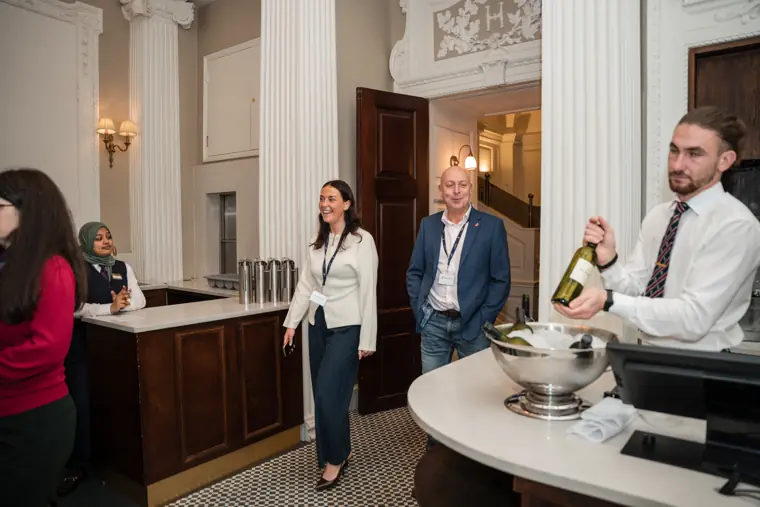 Drinks served as dinner guests arrive.