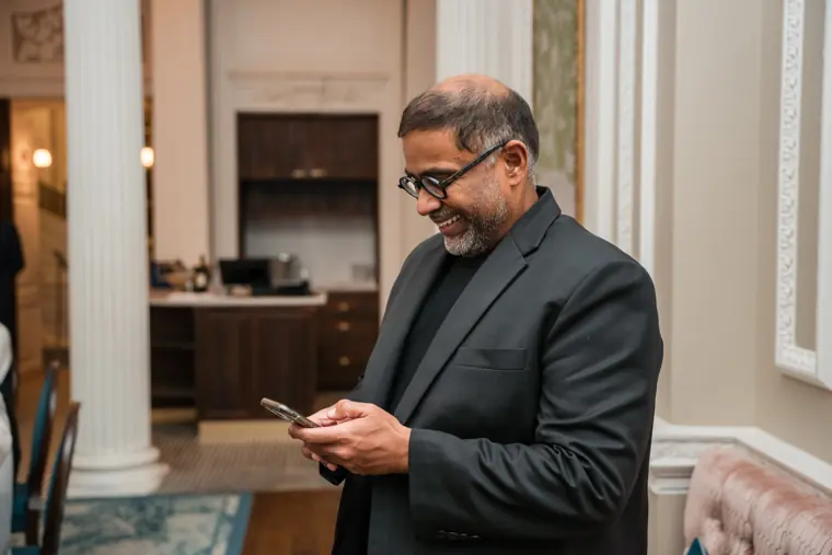 Guest checking a message during the wrap-up.