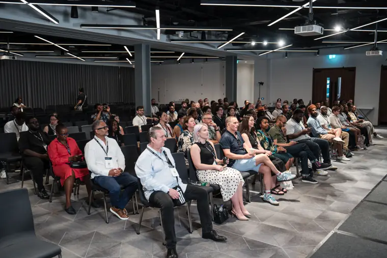 Audience listening at the conference.