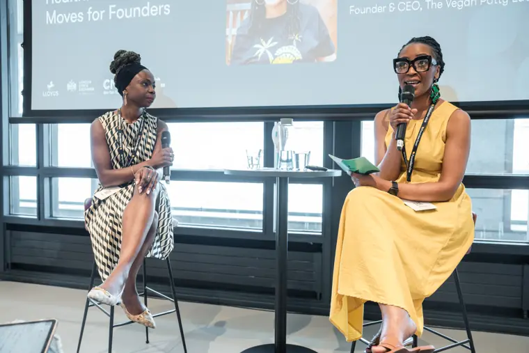 Two panellists in conversation.