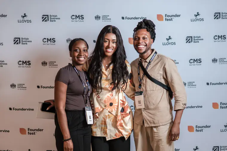 Founderfest guests at the photo wall.