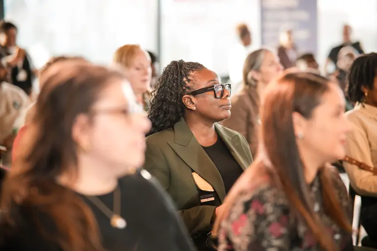 Guests listen closely during the showcase.