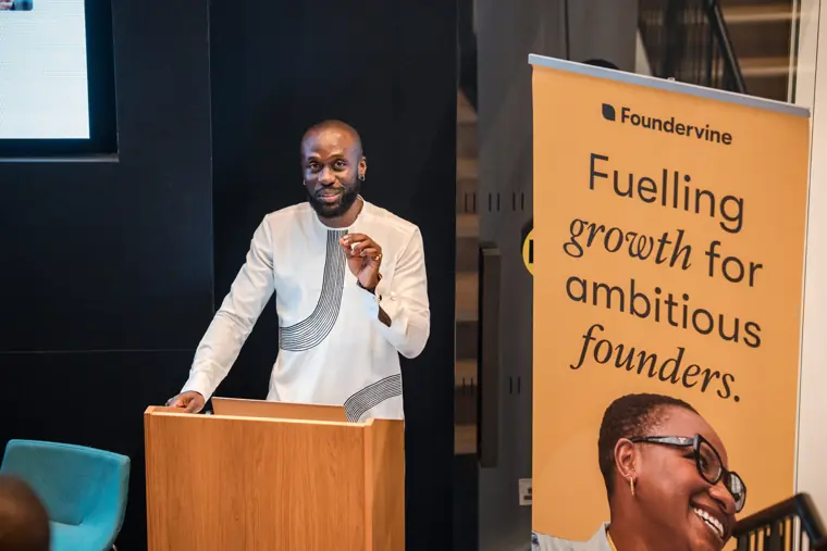 The opening speaker at the lectern.