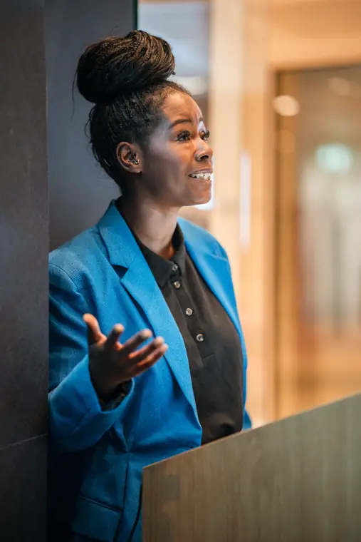 A speaker addresses guests from the lectern.