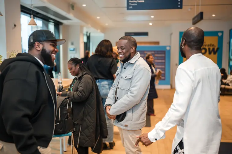 Attendees reconnect during the break.
