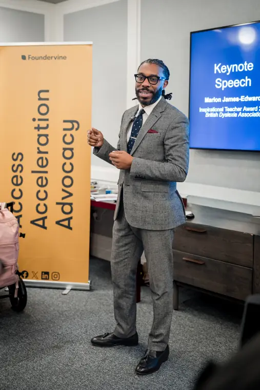 A speaker shares the programme with the room.