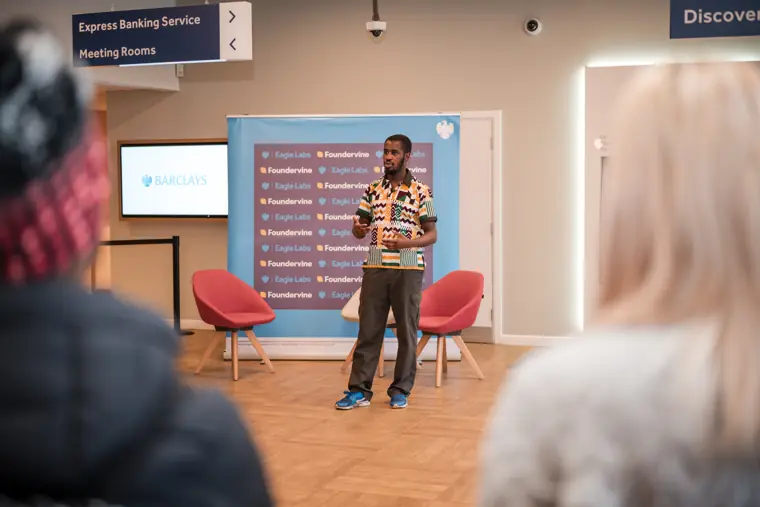 A founder shares his experience with the audience.
