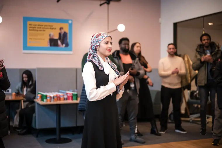 A speaker contributes to the group discussion.