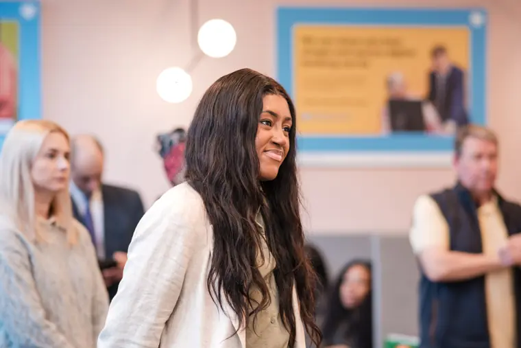An organiser smiles during the programme.