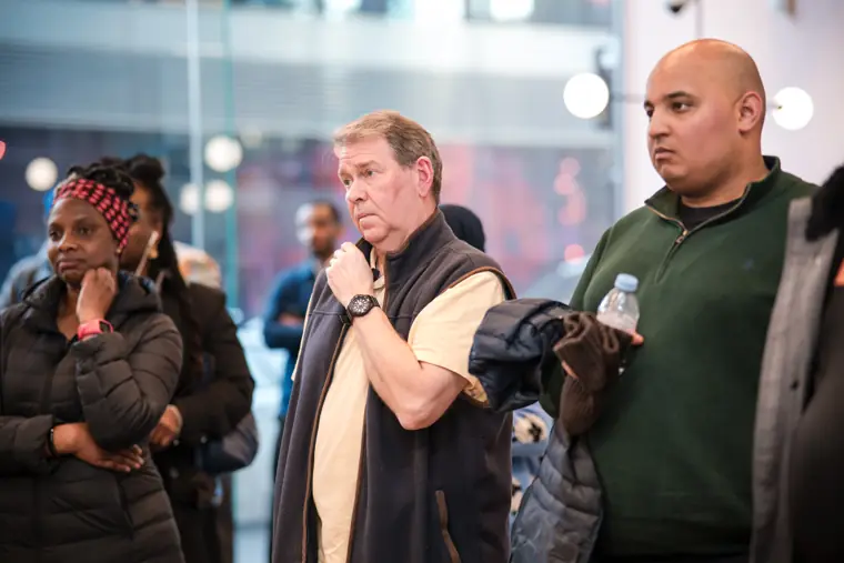 An attendee asks a question during the session.
