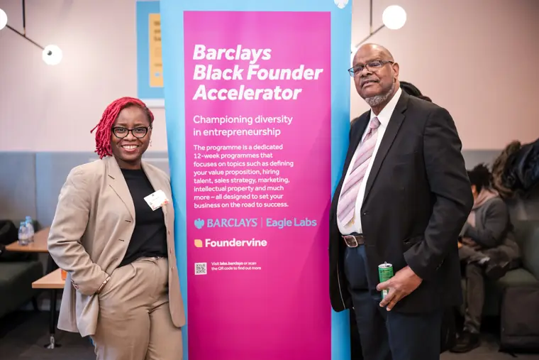 Two founders pose with a colleague.