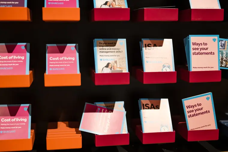 Programme cards on display at the event.