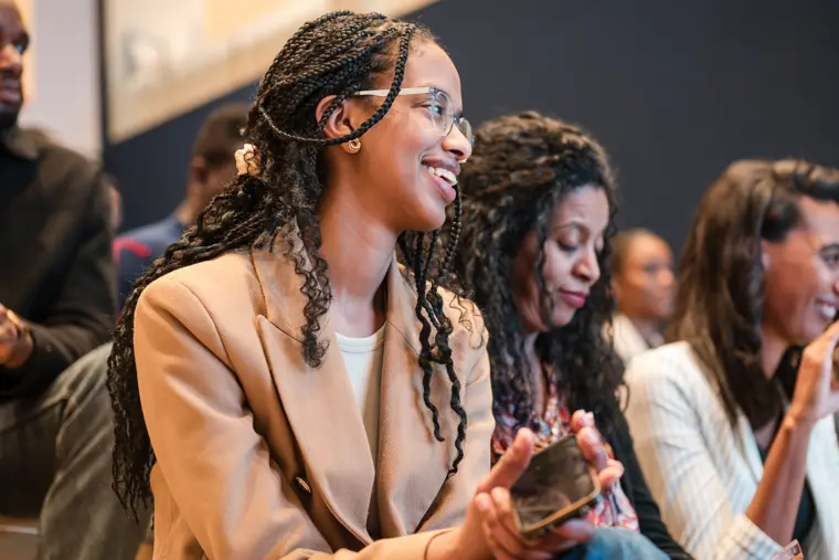 Audience members react during the programme.